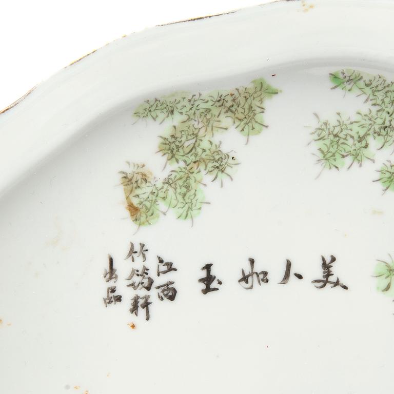 A set of two Chinese porcelain trays decorated with elegant ladies and children, 20th century.