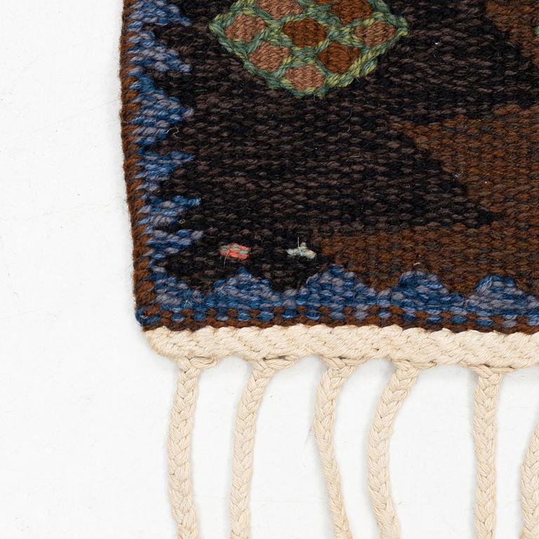 Barbro Nilsson, a carpet, flat weave, "Tånga brun och grön", ca 273 x 211 cm, signed AB MMF BN.