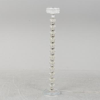 A glass floor lamp.