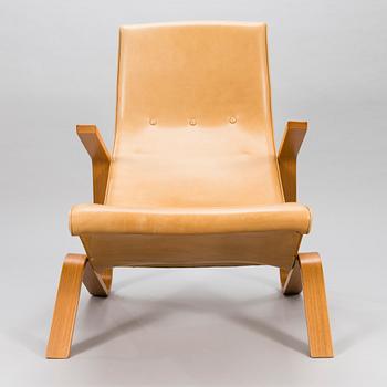 EERO SAARINEN, a 'Grasshopper' armchar and ottoman manufactured under licens by Tetrimäki Finland.
