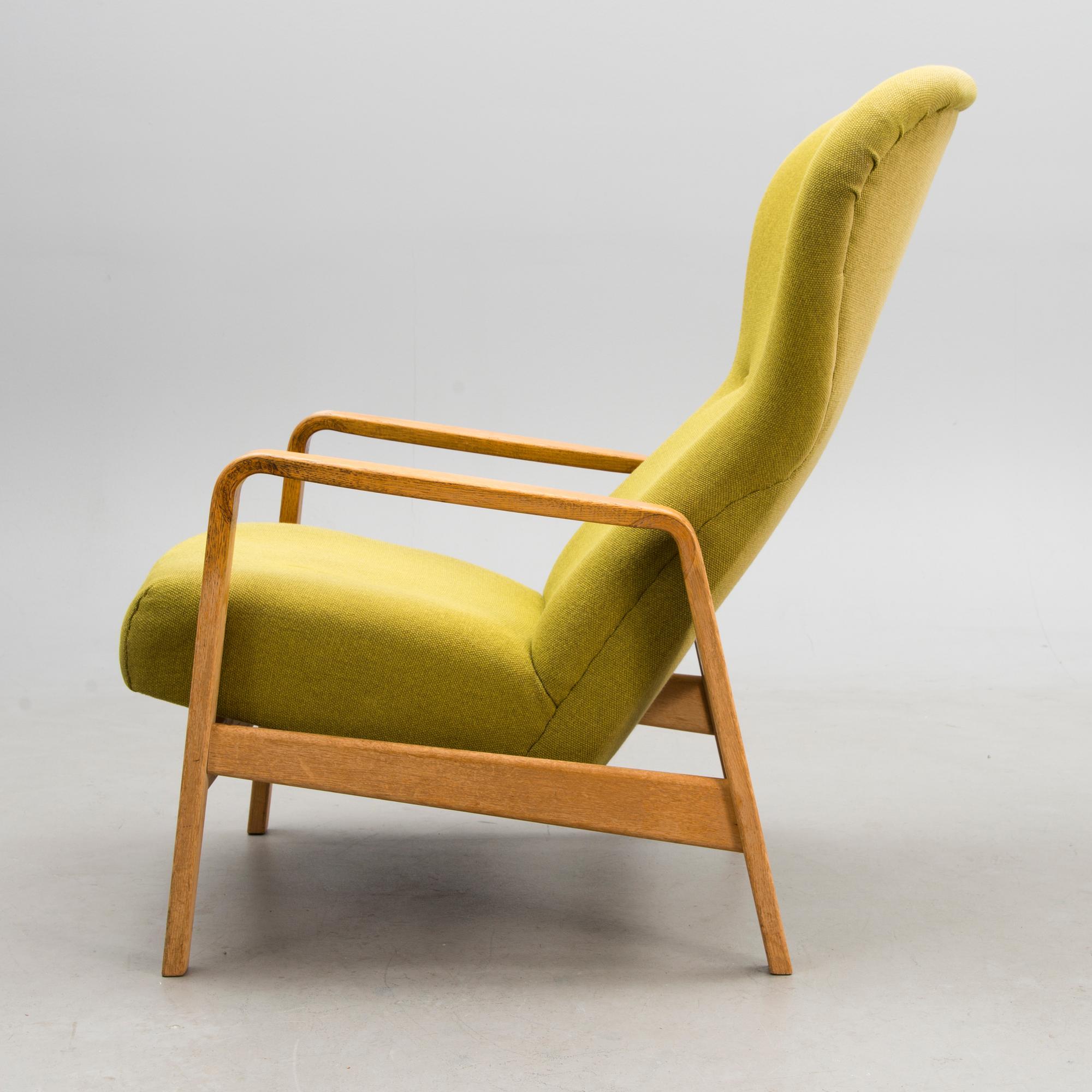 A 1960s 'Puck' armchair for Keravan Puusepäntehdas, Stockmann, Finland.