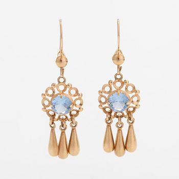 A pair of 14K gold earrings with synthetic spinels.