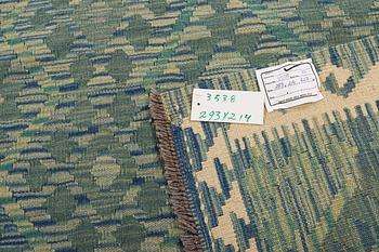 An Afghan kelim carpet, c. 293 x 214 cm.
