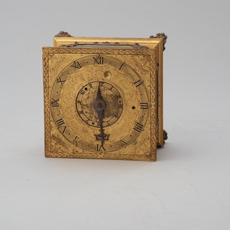 A Baroque 17th century traweller's clock in original case.