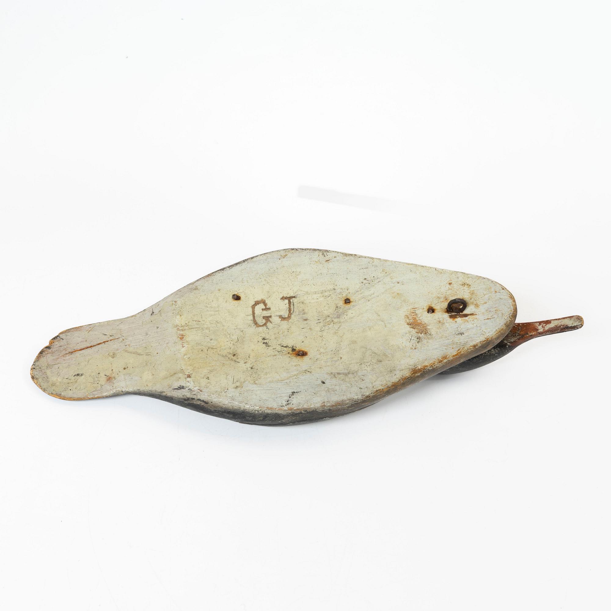 A pair of wood duck decoys, 20th century.