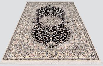 A rug, Nain Part Silk, so called 9 LAA, ca 243 x 150 cm.