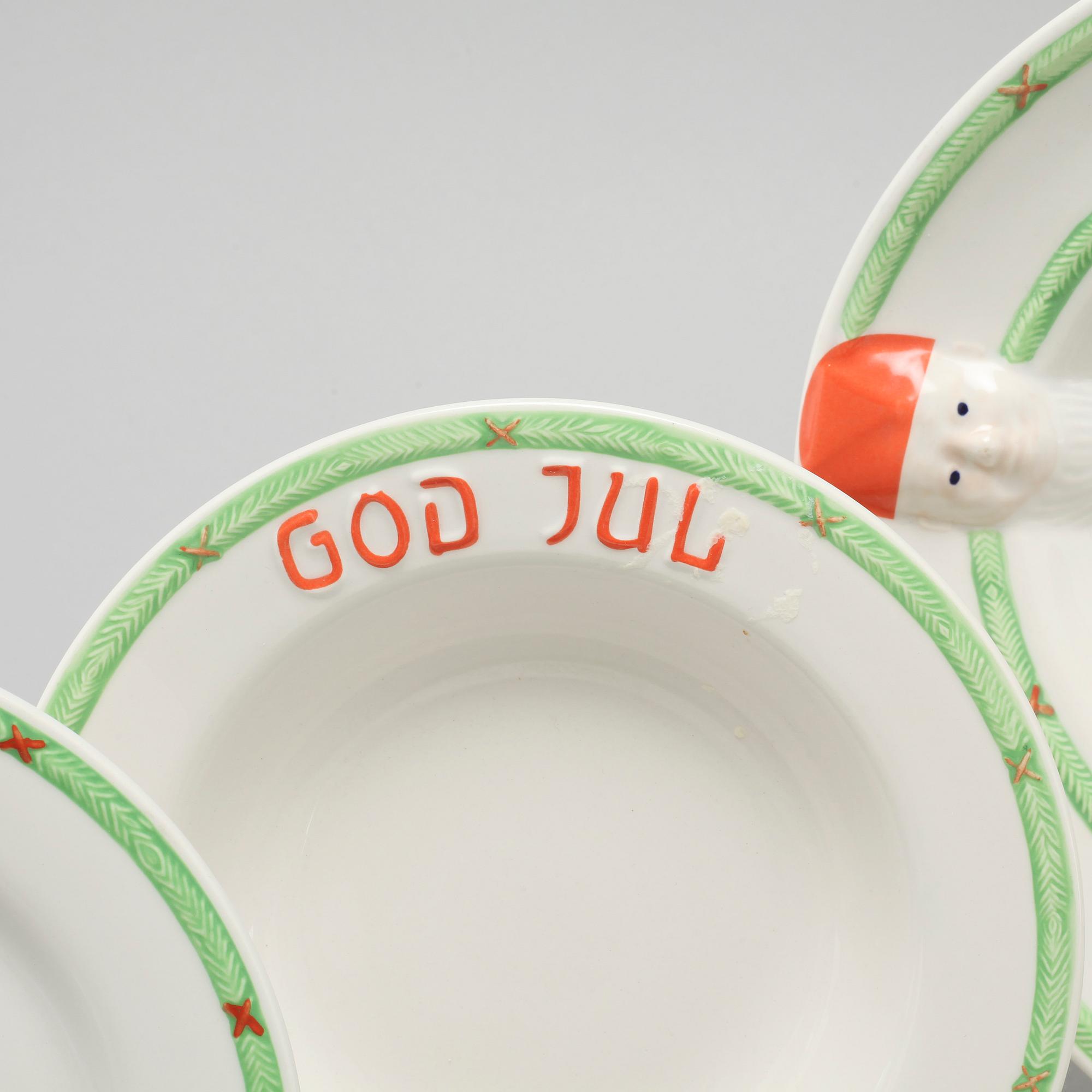 A 20th century set of earthenware tableware of 21 pcs by Gustavsberg.