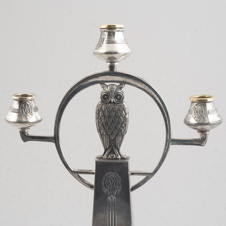 A pair of Jugendstil candelabra, Württembergische Metallwarenfabrik (WMF), Germany, early 20th Century.