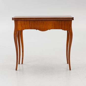 A Rococo game table, 18th century.