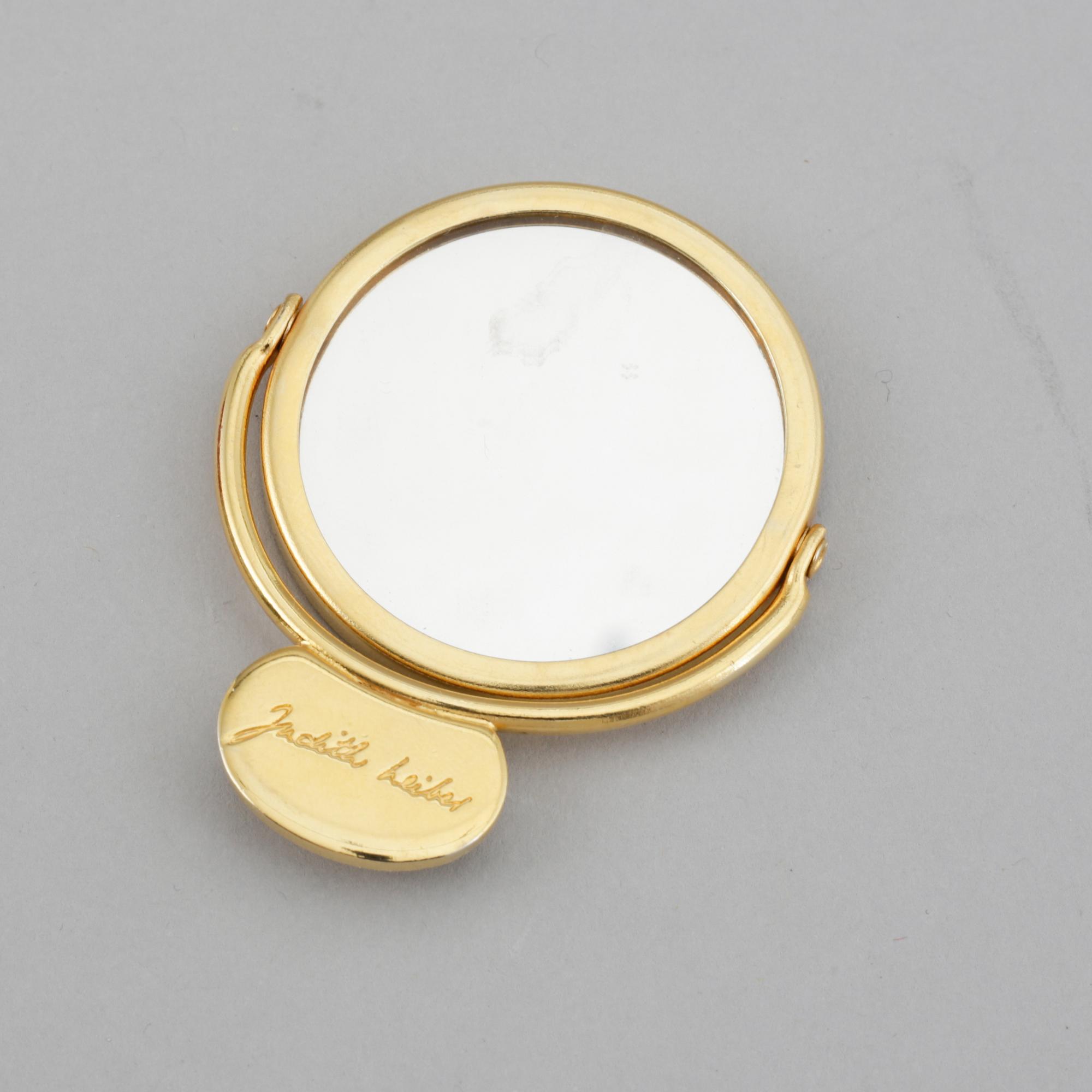 Judith Leiber, a vintage evening clutch from Saks Fifth Avenue.