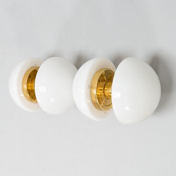 KLAUS MICHALIK, a pair of wall lamps, "Bau", Orno.