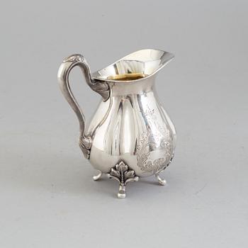 A 3 part silver coffee service dated 1937.