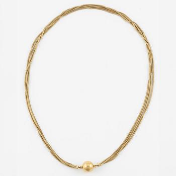 Ole Lynggaard, necklace, four strands, 18K gold with clasp.
