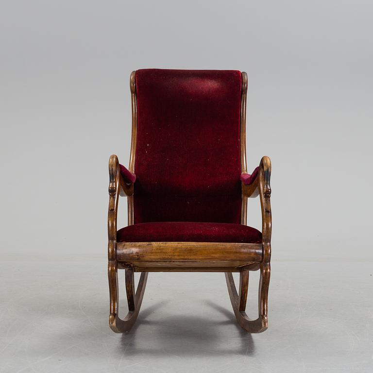 A 19th century swan arm rocking chair.