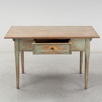 A 19th Century table with a drawer.