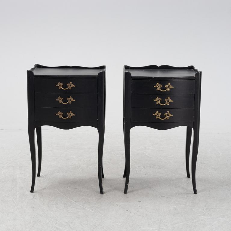 A pair of painted Rococo style bedside tables, second half of the 20th Century.