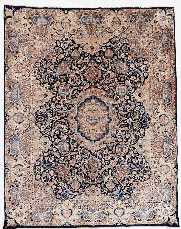 An oriental carpet, circa 387 x 301 cm.