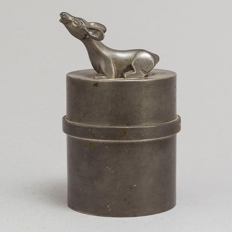 A pewter jar with lid from Firma Svenskt Tenn in 1931.