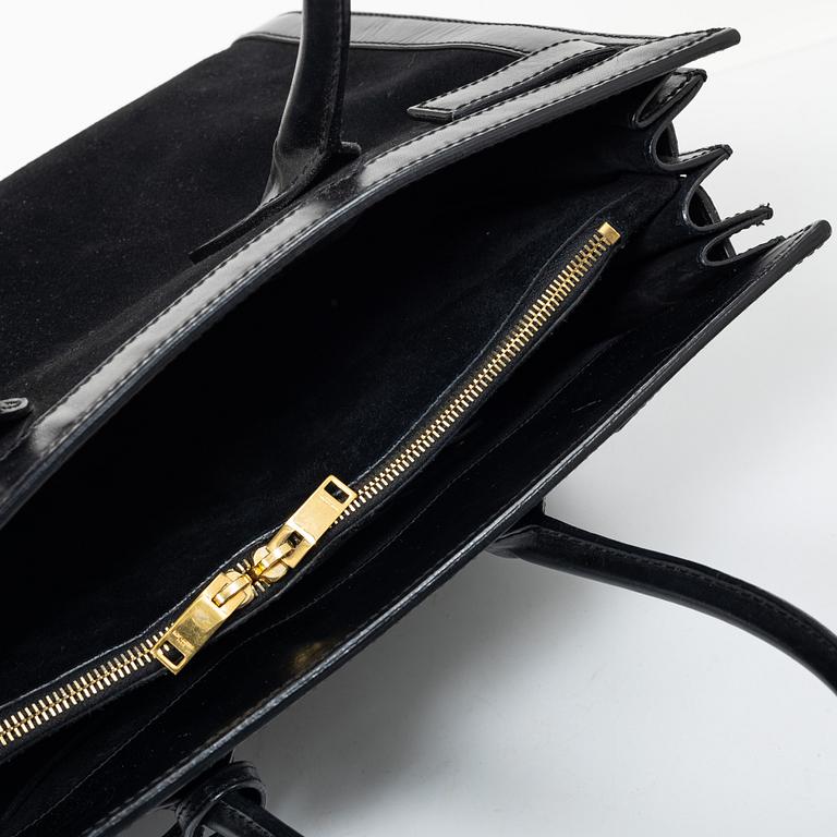 Yves Saint Laurent, a 'Sac du Jour' handbag.