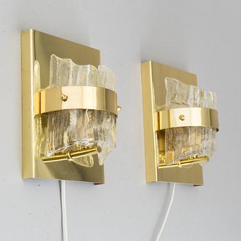 A pair of wall lights marked Fred L. Thiesen, 20th century.
