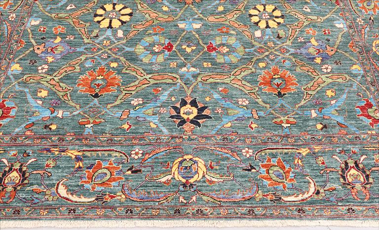 A carpet, Ziegler Design, c. 314 x 243 cm.