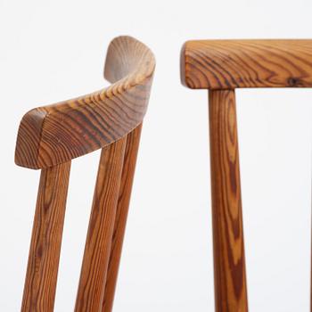 Axel Einar Hjorth, a set of six stained pine "Utö" chairs, Nordiska Kompaniet, Sweden, 1930s.
