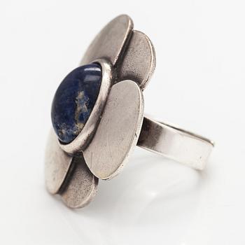 Eila Minkkinen, A sterling silver ring "Wild rose" with a sodalit. Kalevala Koru, Helsinki 1973.
