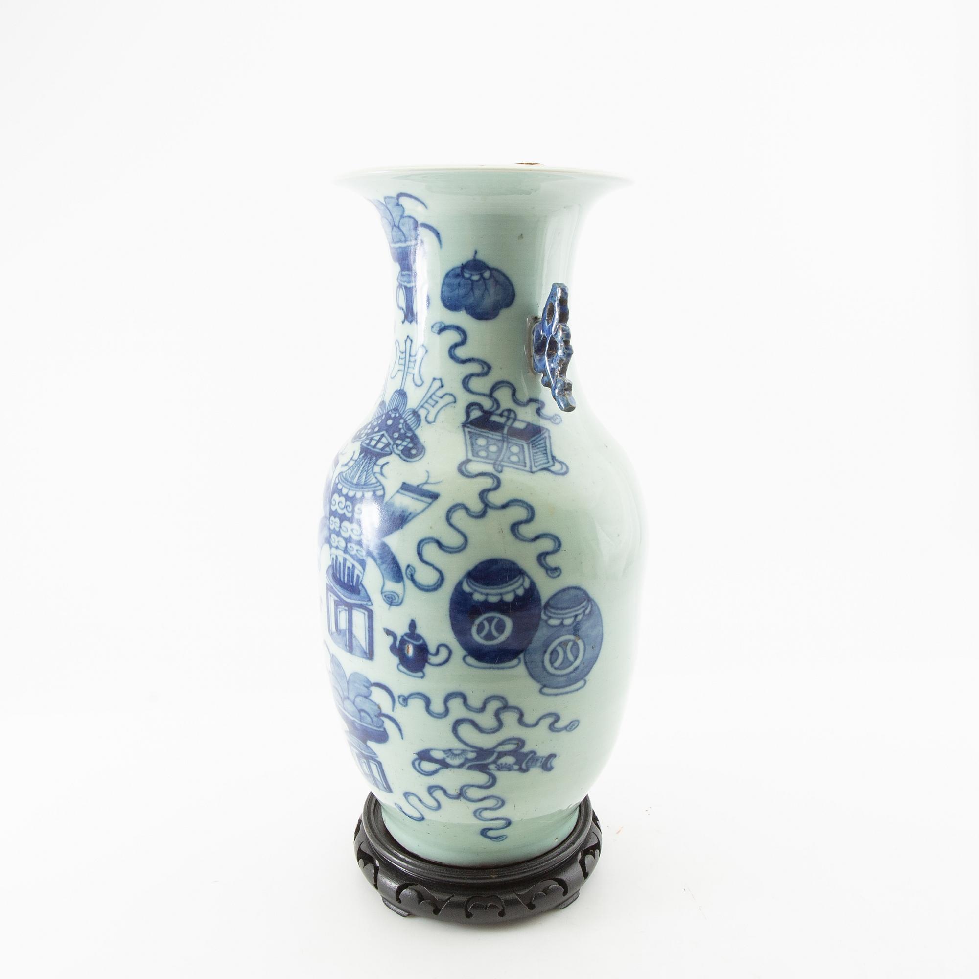 A celadon ground blue and white vase, 20th century.