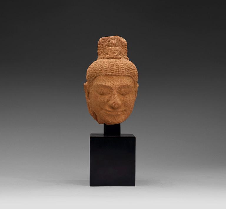 A sand stone figure of a Buddhas head, Thailand presumably 12th century.