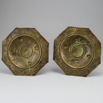 A pair of baroque style candle holders.