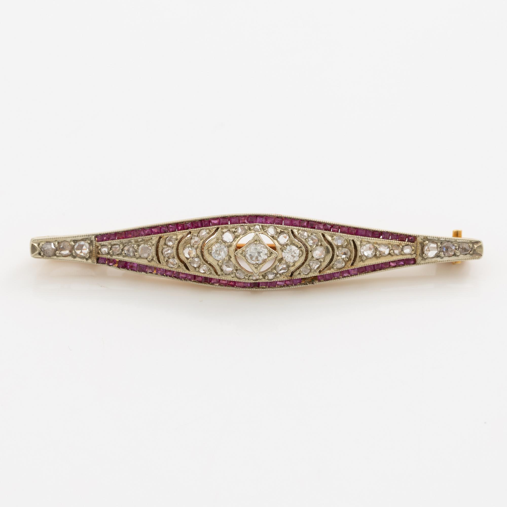 Brooch, 18K gold set with rose-cut and old mine-cut diamonds and probably synthetic rubies, circa 1900.