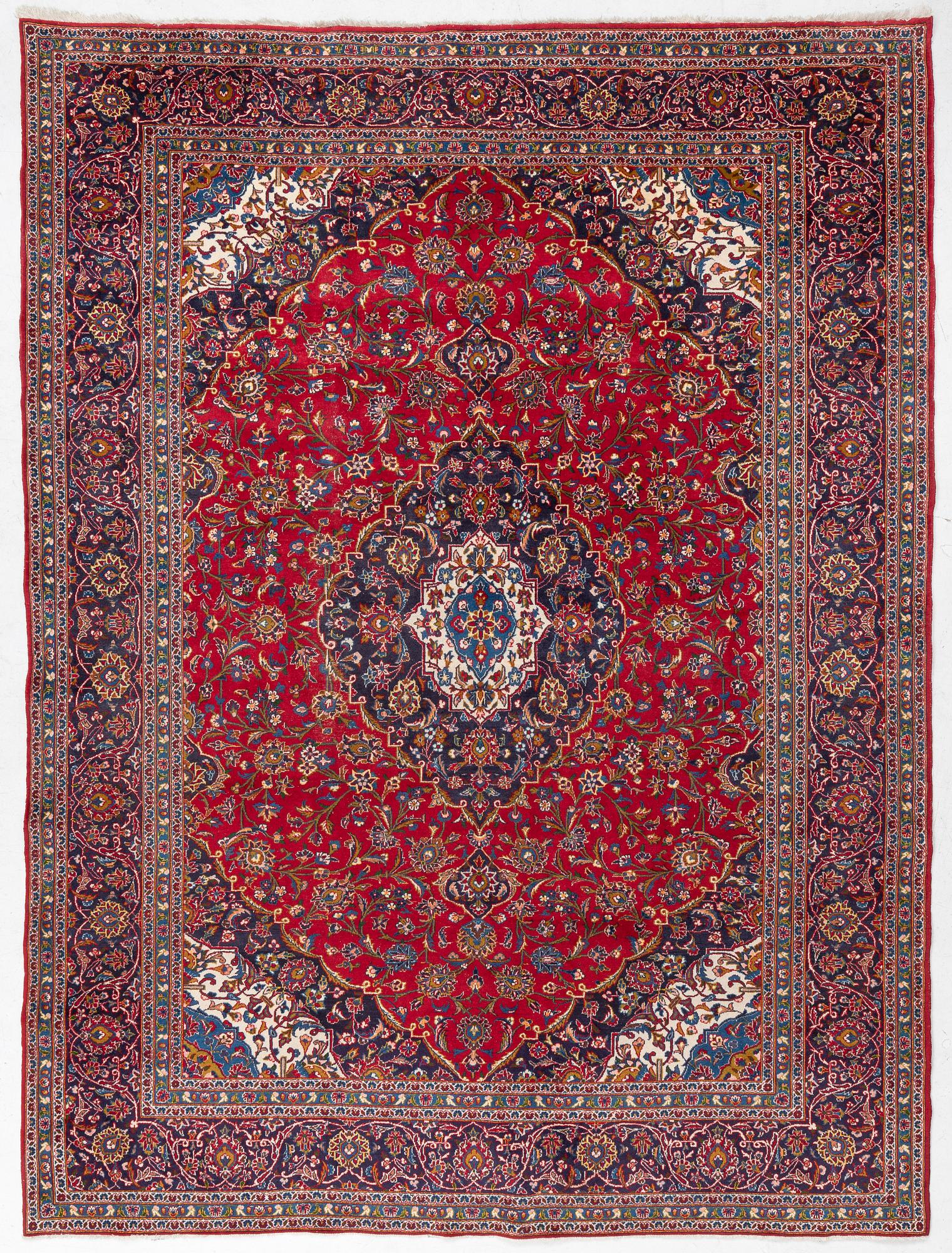 An Oriental carpet, c. 396 x 300 cm.