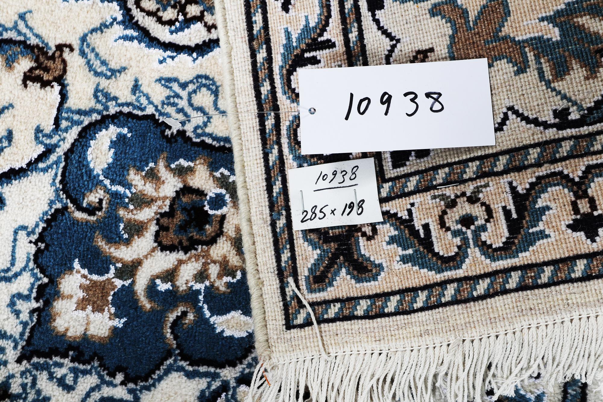 A carpet, Nain, 285 x 196 cm.