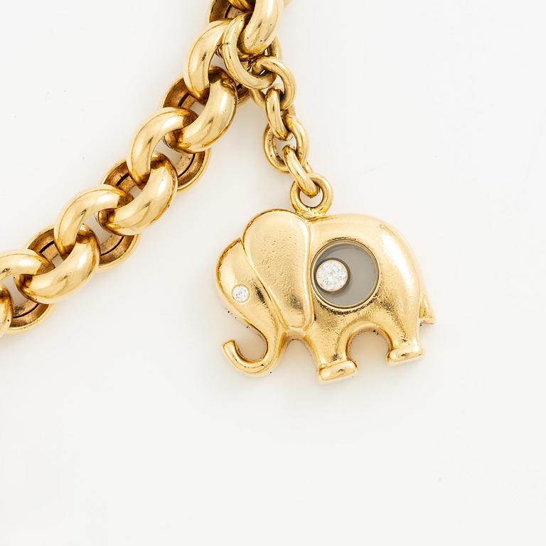 Chopard armband med berlocker 18K guld med runda briljantslipade diamanter.