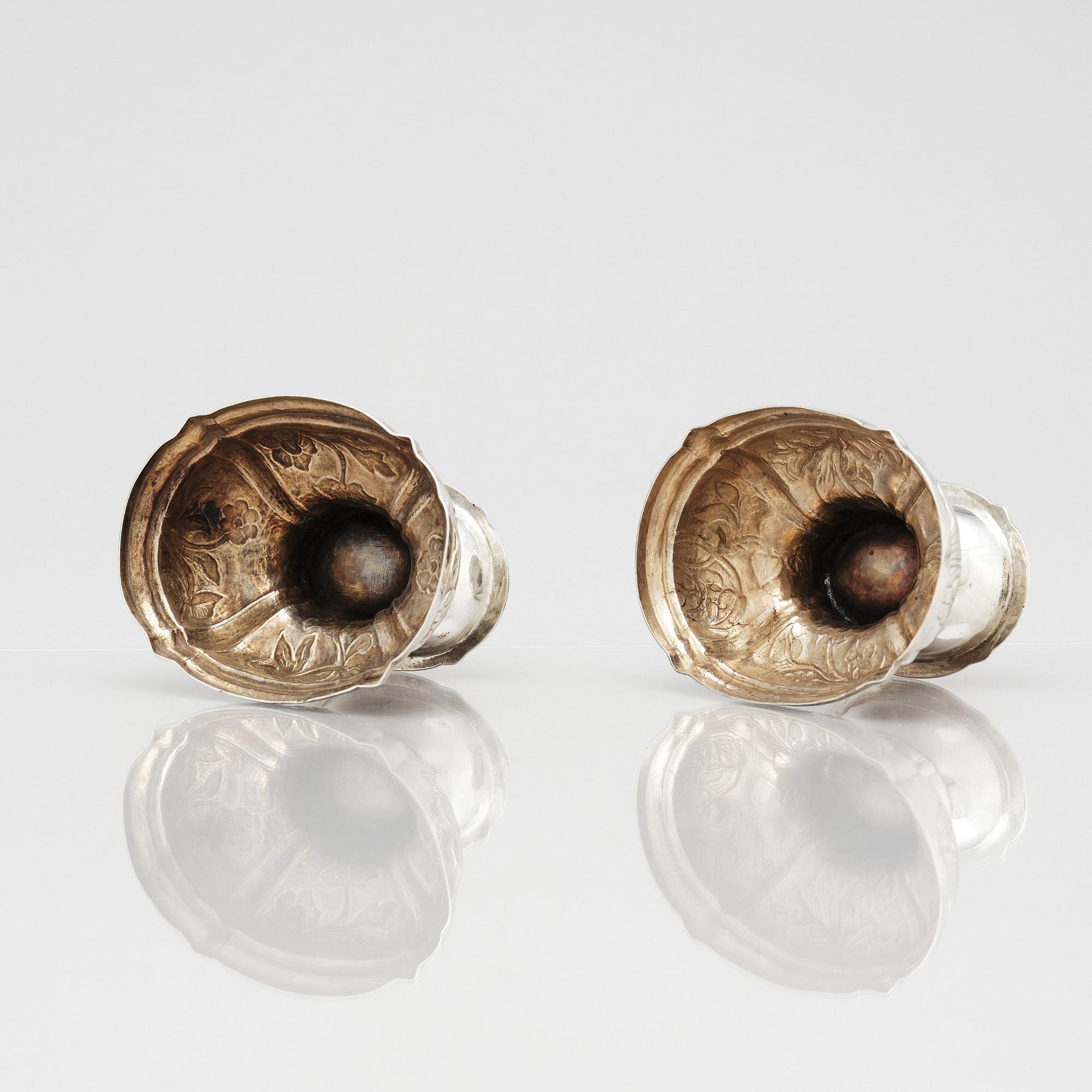 A pair of German rococo parcel-gilt silver salt-cellars, 18th century.