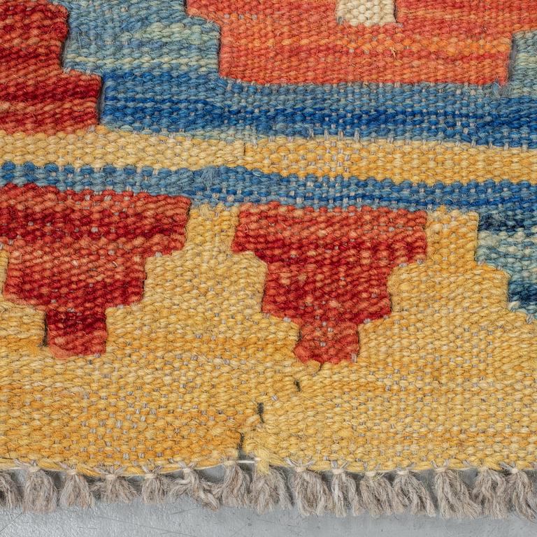 A carpet, kilim, ca 244 x 188 cm.