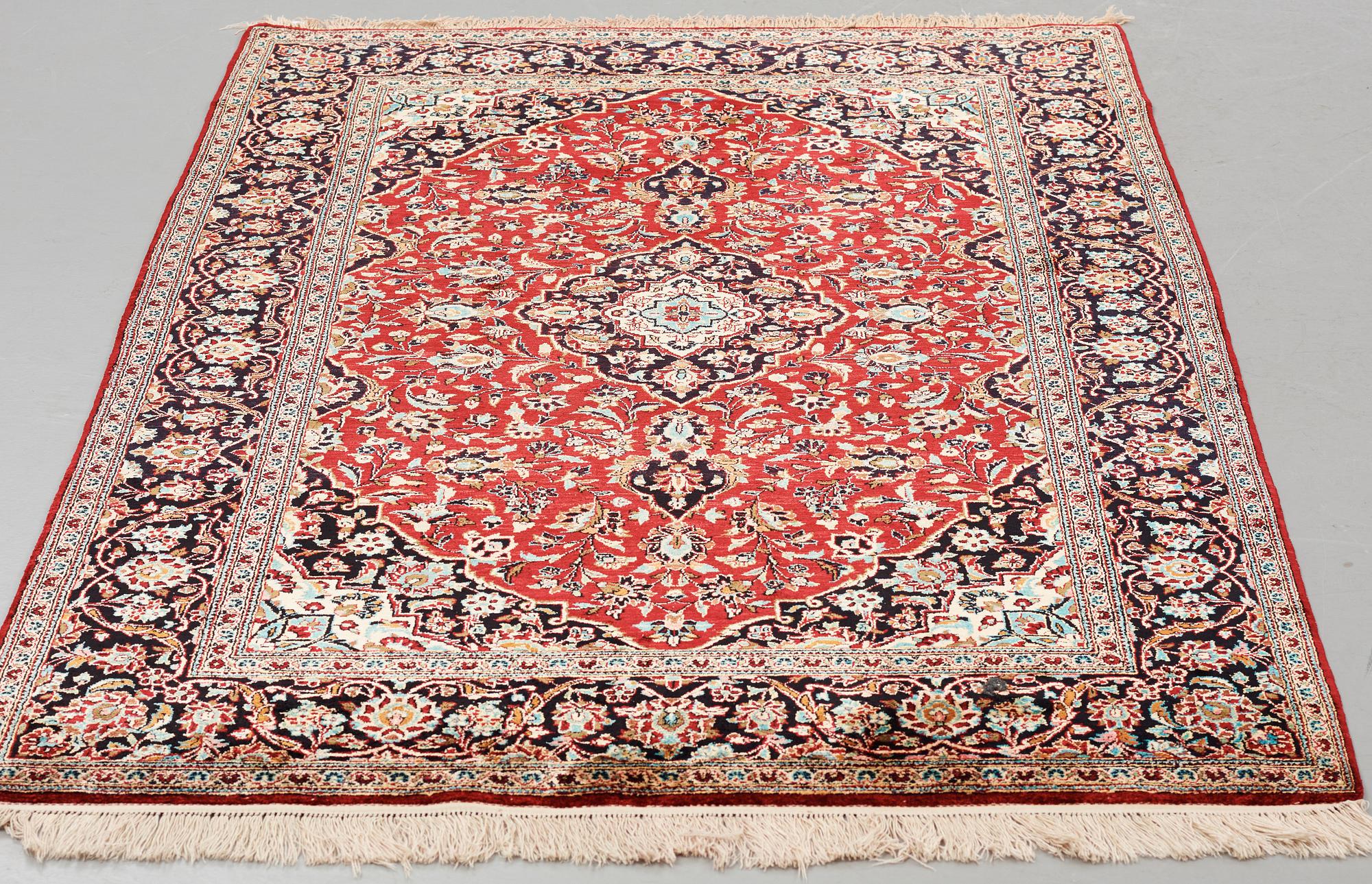 A rug, Old, silk Kashan, ca 224 x 138,5 cm.