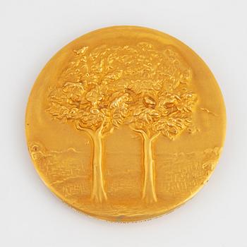 A Swedish commemorative medal in 18K gold.