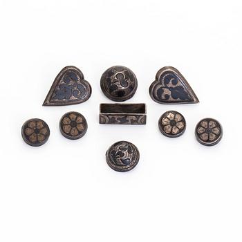 Buttons and part of a belt buckle, silver, niello, Russia.