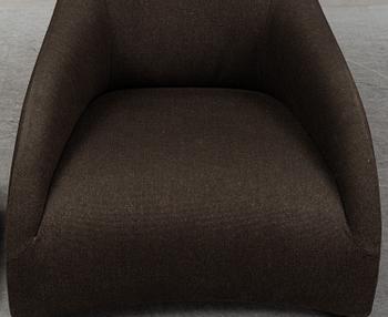 ANTONIO CITTERIO, an 'Apta' easy chair and ottoman, B&B Italia Maxalto.