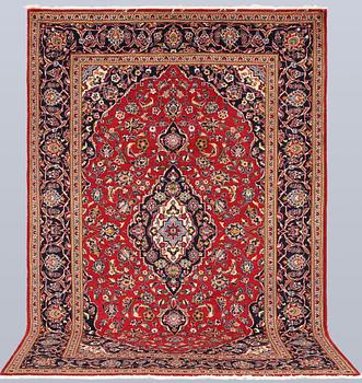 A Keshan carpet, approx. 303 x 202 cm.