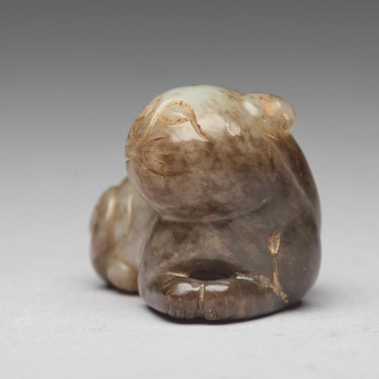 A nephrite figure of a cat, Ming dynasty (1368-1644).