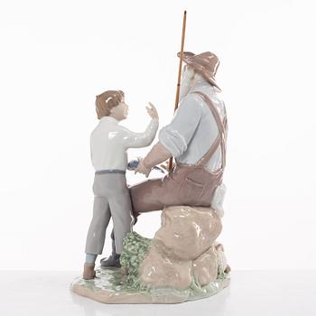 Lladro, two figurines, Salvador Furió, "A fishing lesson", and José Puché, "Fishing with gramps", Spain.