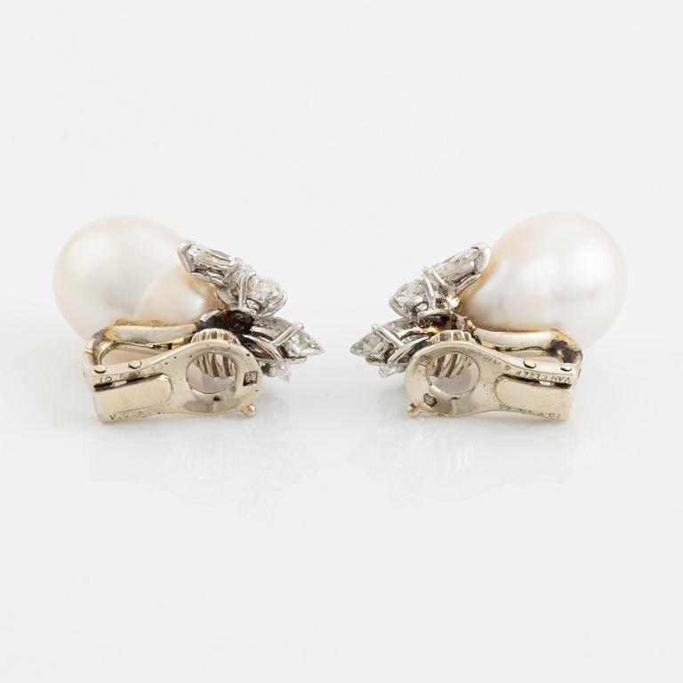 Van Cleef & Arpels a pair of earrings with drop-shaped cultured pearls and marquise and round brilliant-cut diamonds.