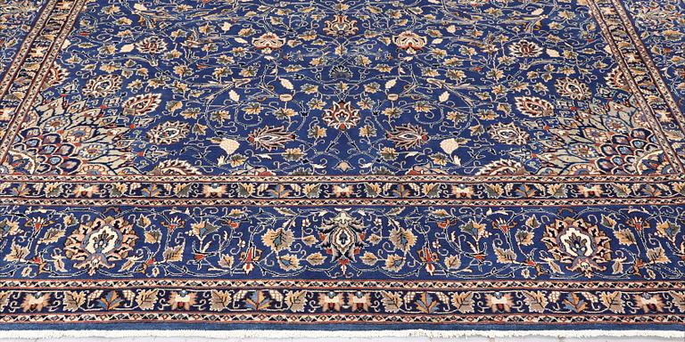 A Kashmar carpet, 408 x 307 cm.