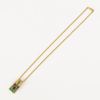 An Andrew Grima pendant in 18K gold set with step-cut emeralds, rubies and round brilliant-cut diamonds.