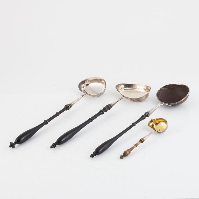 Three soup ladles and one gravy ladle, silver, Visby and Stockholm, Sweden, mid 19th century.