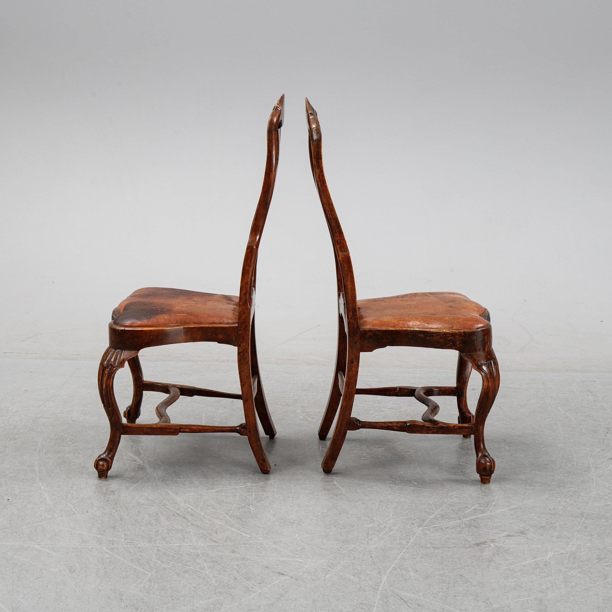 A set of nine English stained beech wood chairs, first half of the 18th Century.