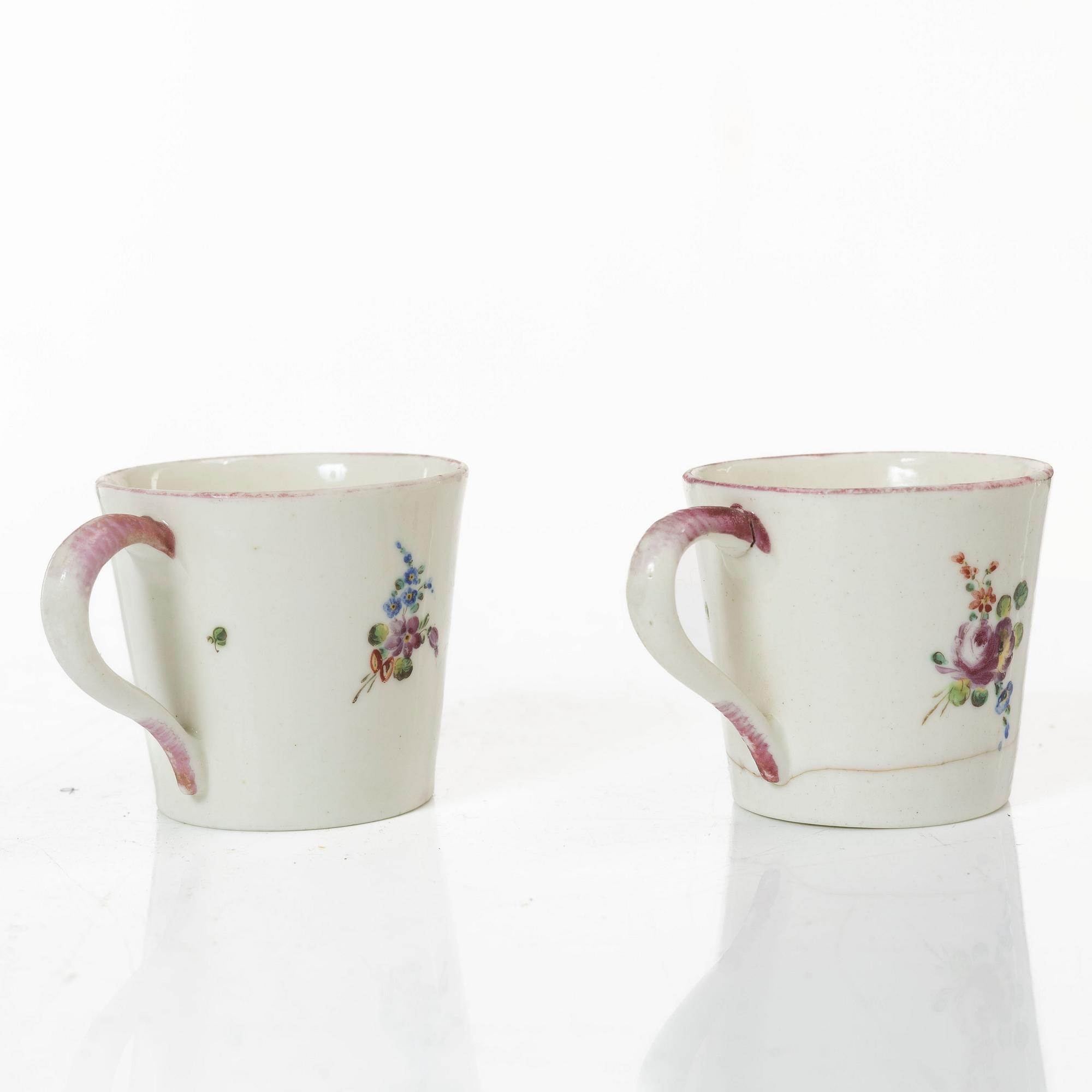A pair of cups and saucers, France, 18th Century.