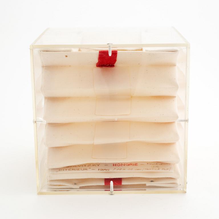 Margit Szilvitzky, a textile and plexi glass sculpture, signed and dated 1976.